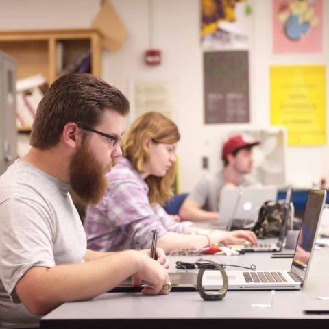 Graphic Design Students working in studio