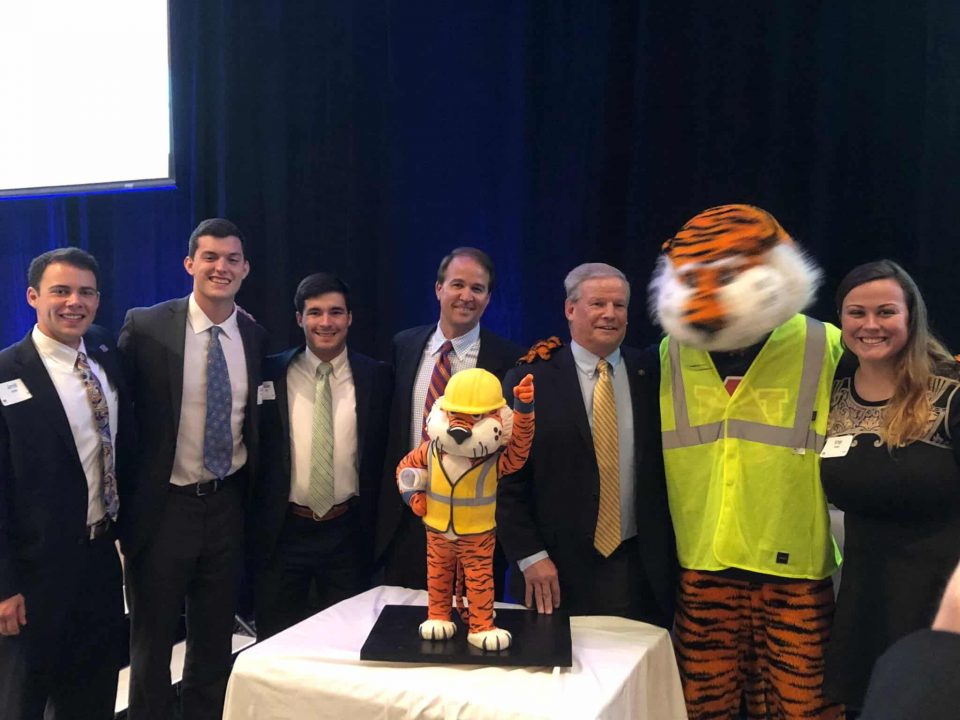 Students pose for group photo at Banquet
