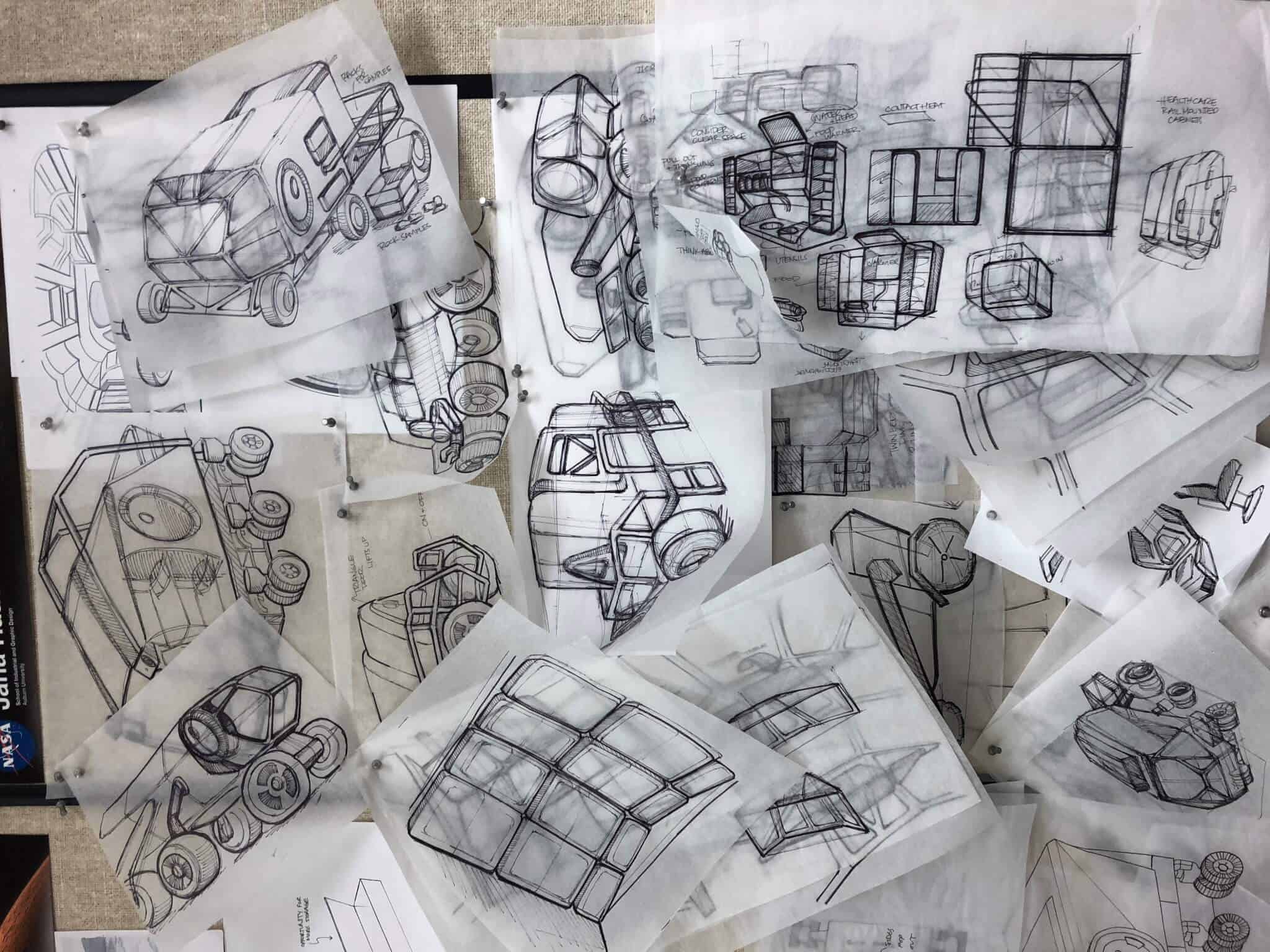 Photo of drawings from NASA sponsored Industrial Design Studio