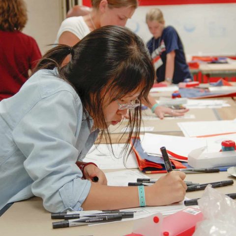High School Student working on a project during the Design Workshop