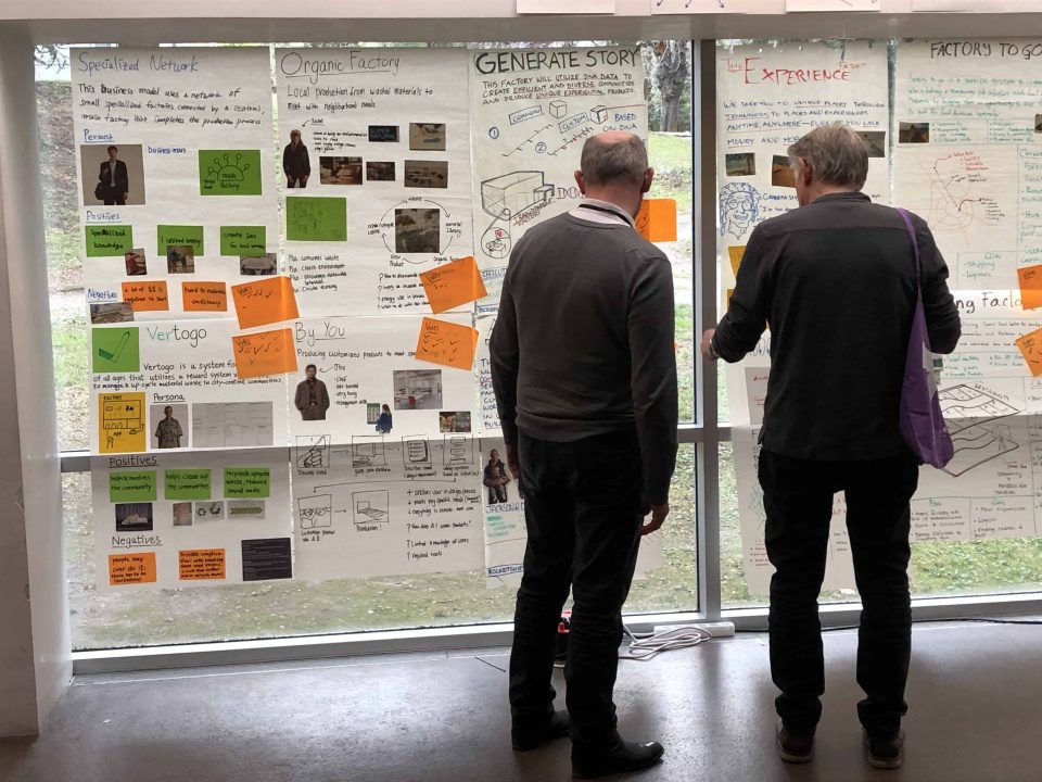 faculty reviewing proposals