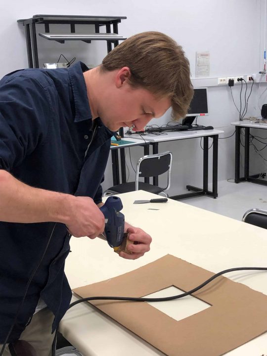 Student making a low-fidelity prototype