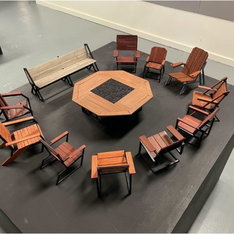 student scale models around fire pit