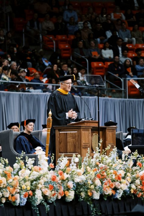 Tom Dempsey '89 addresses Auburn University graduates at the Fall 2023 commencement ceremony