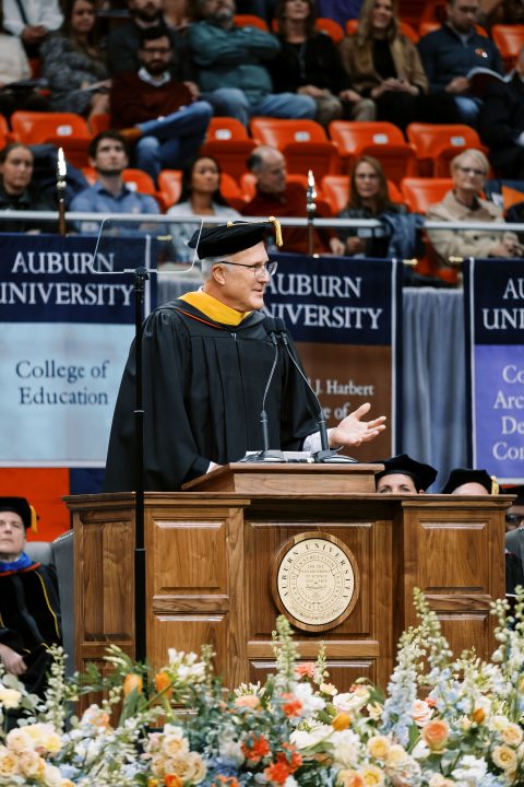 Tom Dempsey '89 addresses Auburn University graduates at the Fall 2023 commencement ceremony