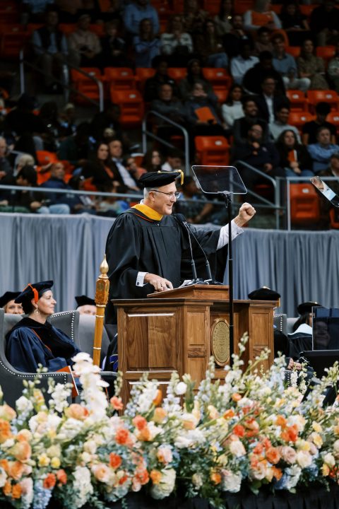 Tom Dempsey '89 addresses Auburn University graduates at the Fall 2023 commencement ceremony