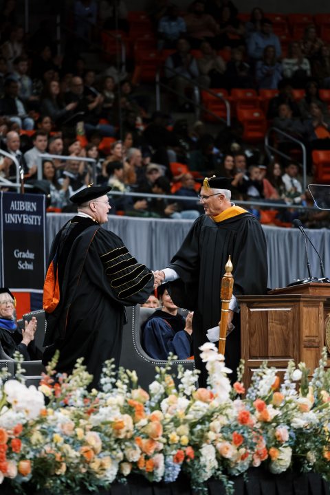 Tom Dempsey '89 addresses Auburn University graduates at the Fall 2023 commencement ceremony