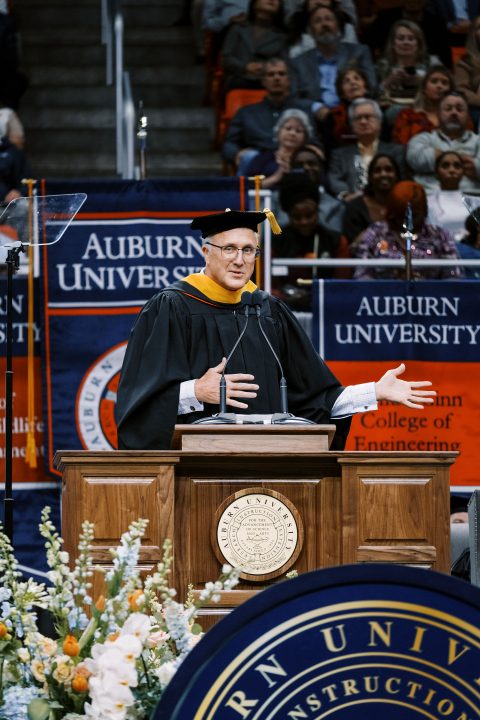 Tom Dempsey '89 addresses Auburn University graduates at the Fall 2023 commencement ceremony