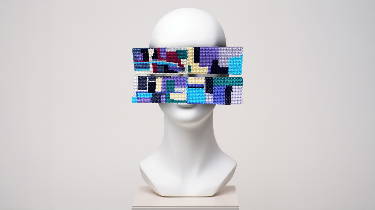 White mannequin head with artwork overlapping the face