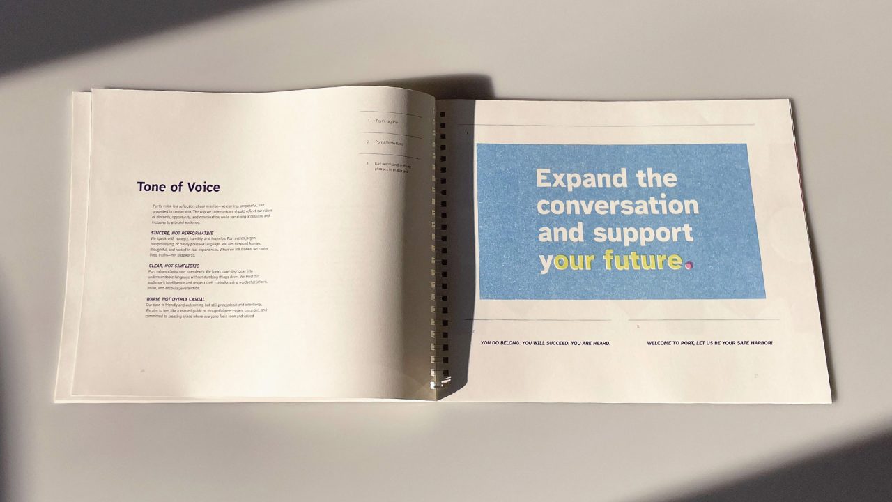 A spiral-bound booklet open to two pages; left page is titled Tone of Voice, right page features text: Expand the conversation and support your future.