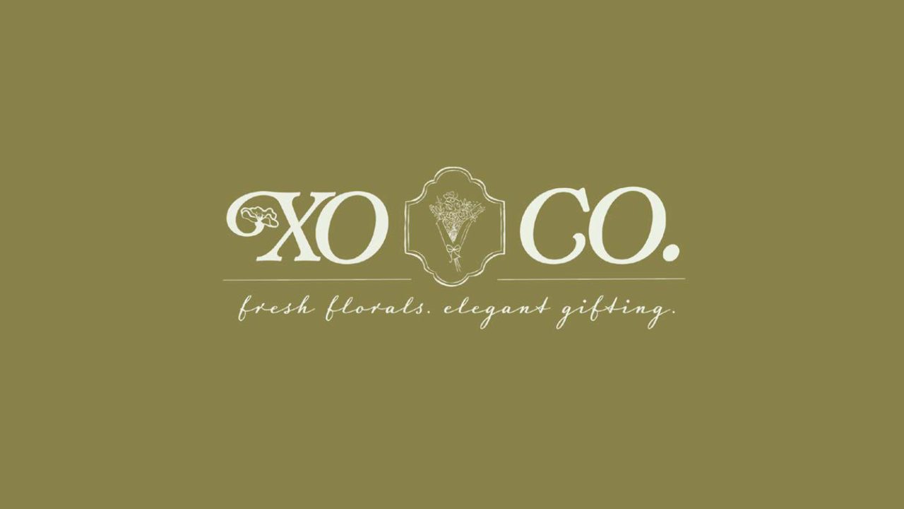 Logo for XOCO featuring floral design, with the tagline fresh florals. elegant gifting. on an olive green background.