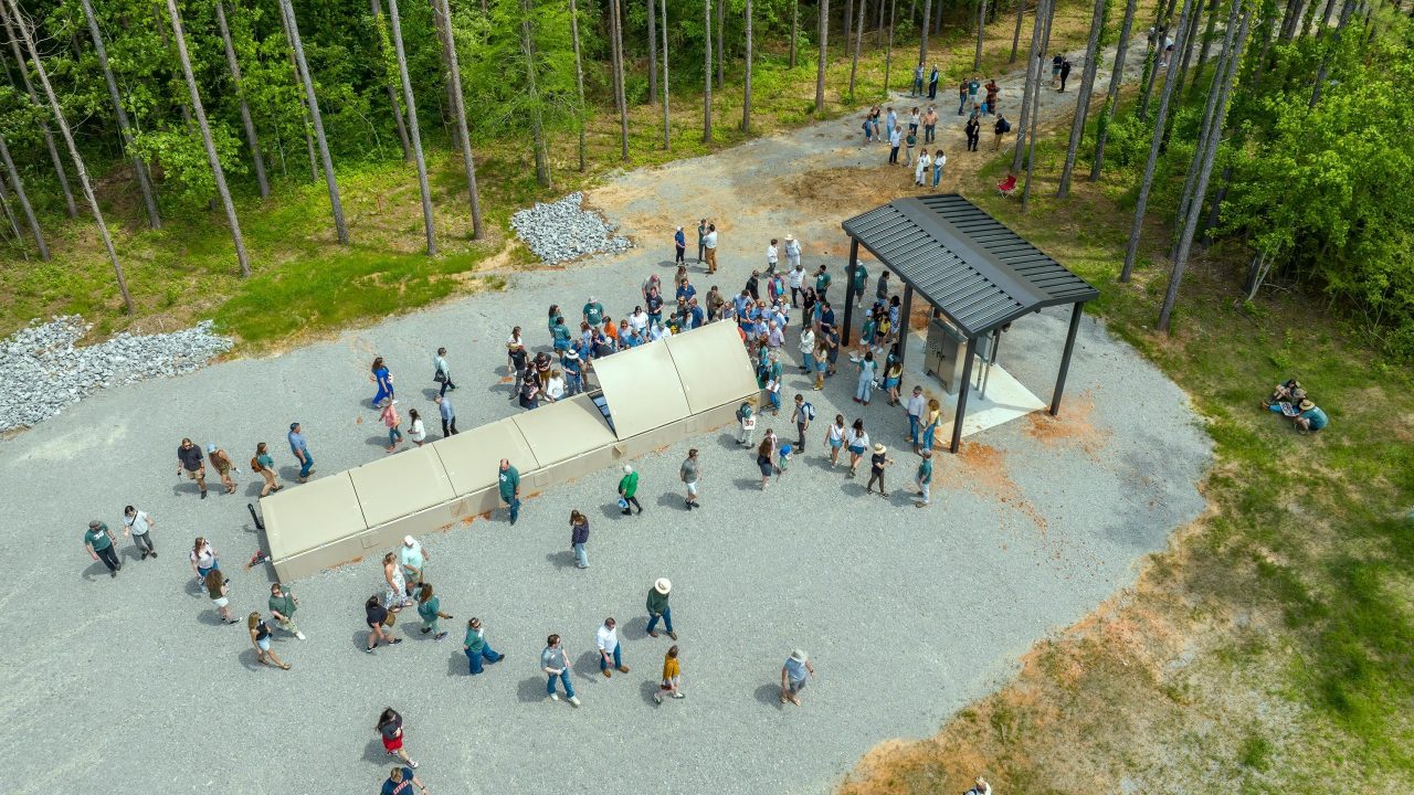 Community members at the site of a research project for rural wastewater treatment