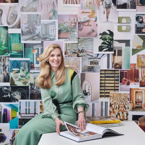 Elizabeth in her office surrounded by her ‘wall of ideas’. Her office is a hive of activity where groups gather to discuss different projects and share new ideas.