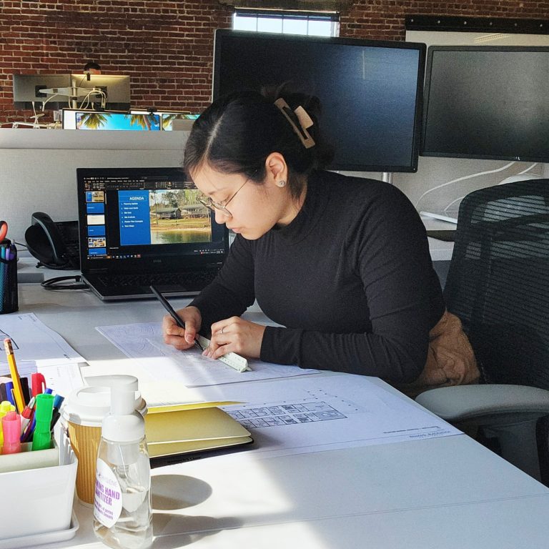 Laura Chavez working at her internship with Williams Blackstock Architects
