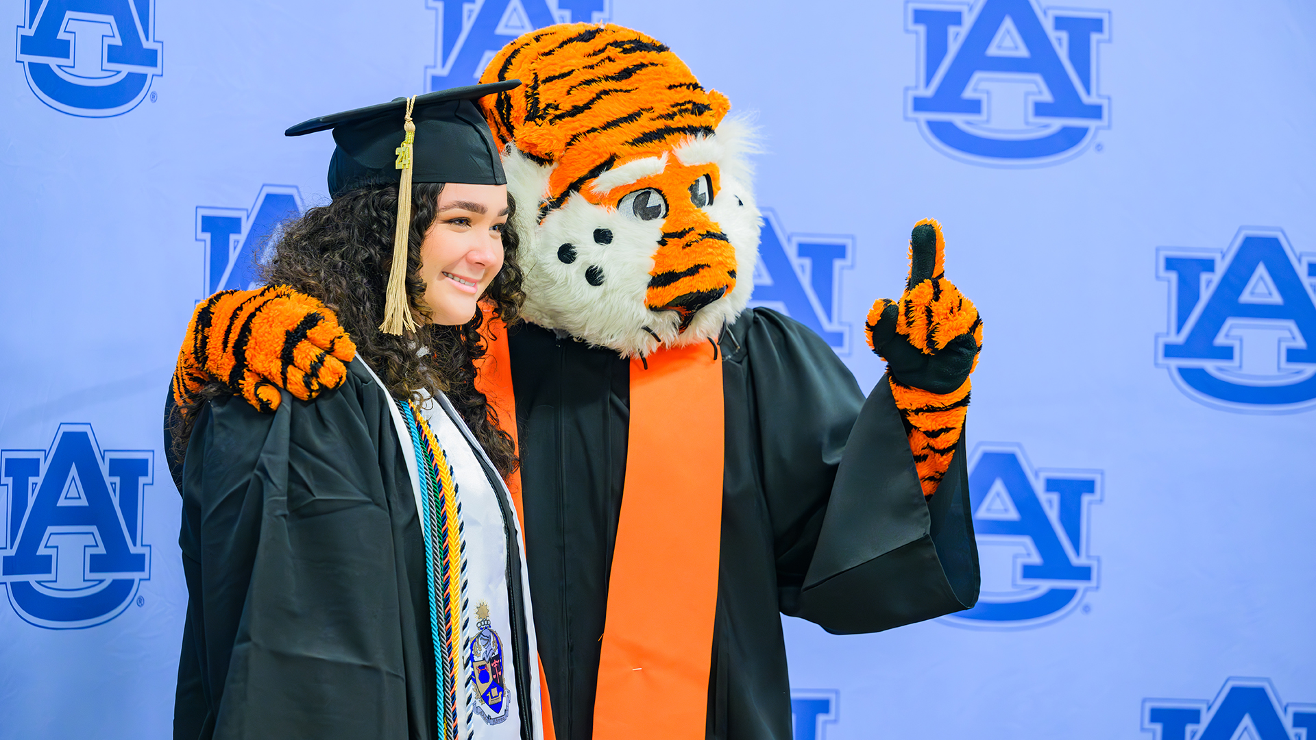 Auburn University graduate with Aubie