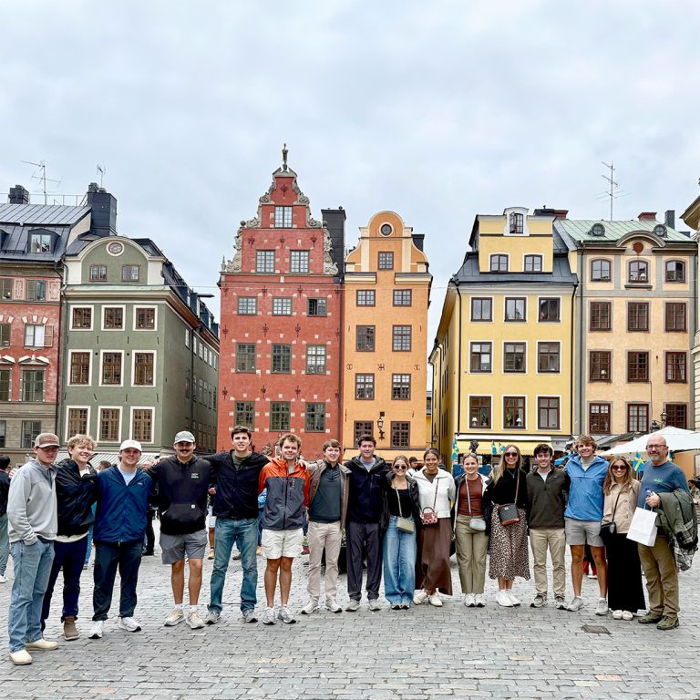Singleton (fourth from the left) stands with his BSCI classmates in Stockholm, Sweden during a Summer 2025 study abroad trip.