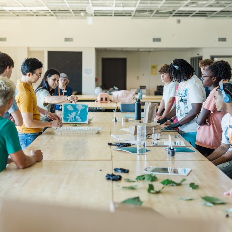 Assistant Professor Frank Hu led landscape architecture campers in a cyanotyping project.