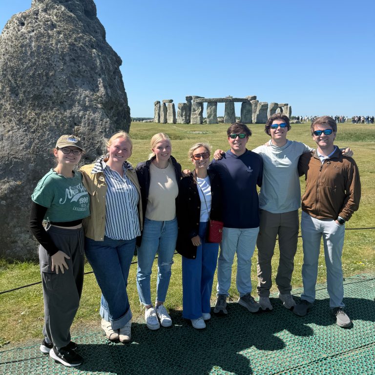 Beck Stallworth (second from the left) said seeing the size and placement of the Stonehenge stone up close made her “truly appreciate the mystery and craftsmanship behind the ancient structure.”