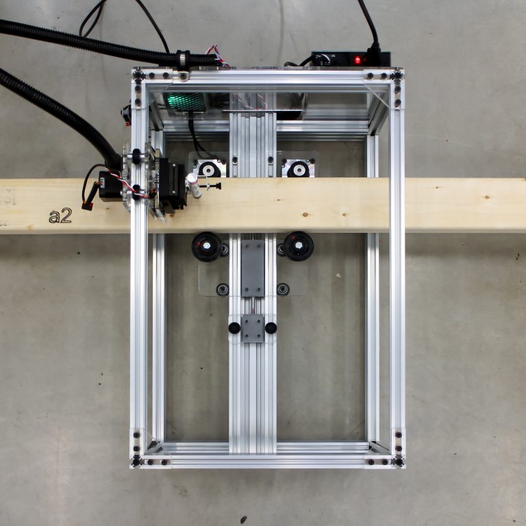 Scribe 2.0 marks part numbers and codes on the lumber. | Photo by Cait McCarthy