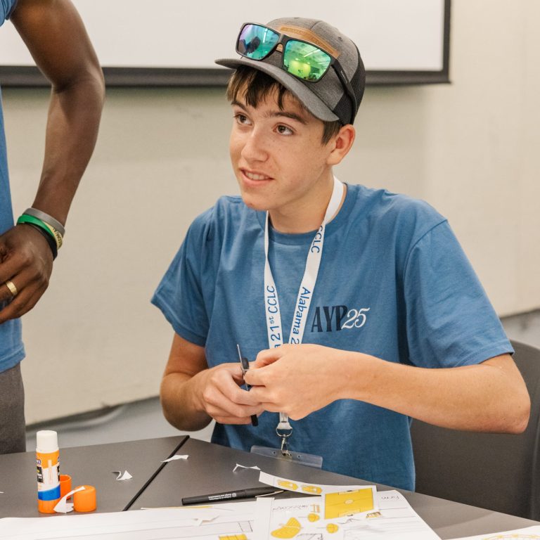 Students cut out park elements or draw their own.
