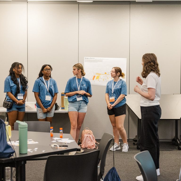 The workshop gives the students an opportunity to practice public speaking.