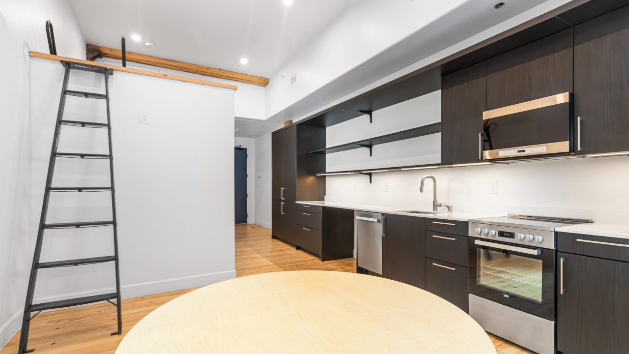 The William apartments boast modern kitchens and lofted living space.