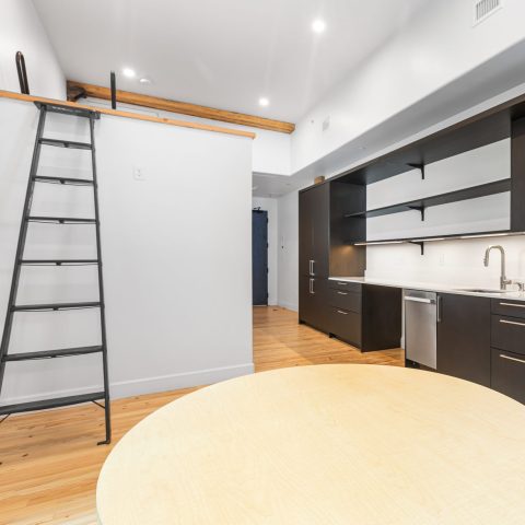 The William apartments boast modern kitchens and lofted living space.