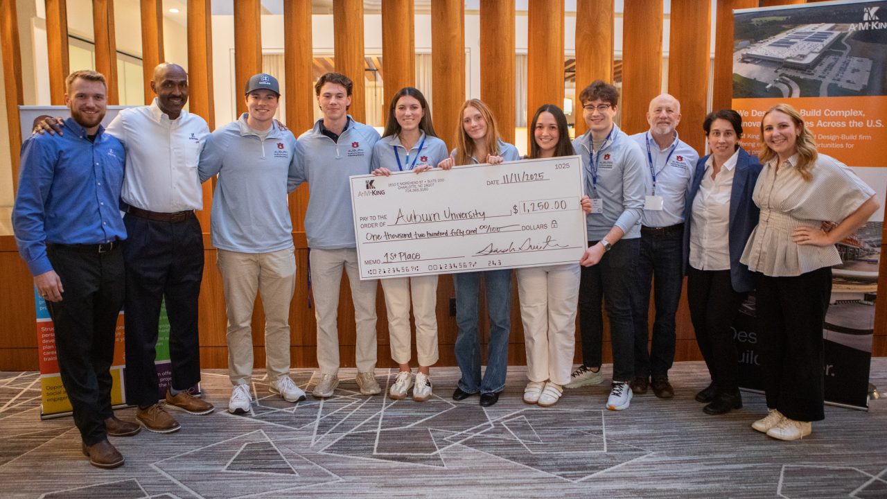 Coached by Senior Lecturer Bob Muir (third from the right), the Design Build team won first place at ASC Region 2 in Greenville, South Carolina.