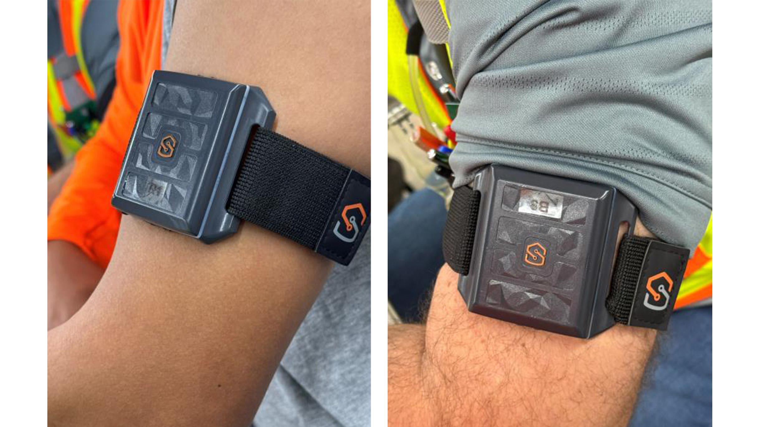 Two people wearing gray, rectangular electronic devices with black straps and orange logos on their upper arms over work clothing.