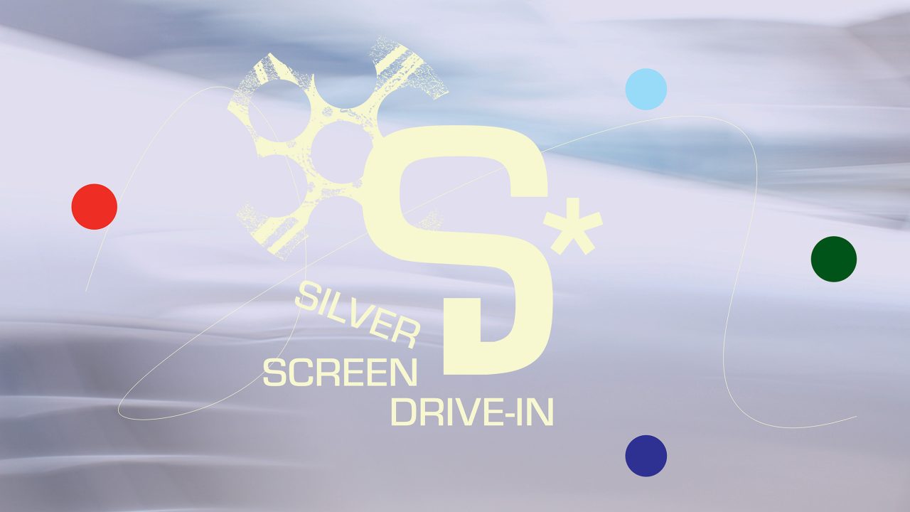 Abstract background with the words Silver Screen Drive-In and a large S* in light yellow, surrounded by five colored dots and a faint film reel graphic.