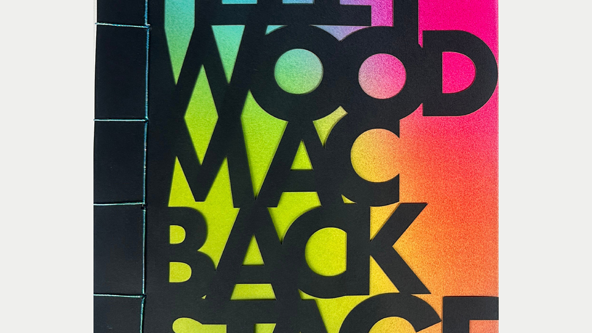Book cover with large black text reading FLEETWOOD MAC BACKSTAGE over a colorful gradient background with visible thread binding on the left side.