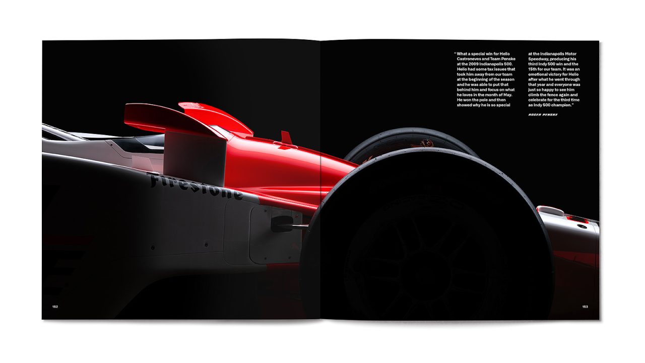 A magazine spread shows a close-up side view of a red and white race car on the left page, with text and a quote on a black background on the right page.
