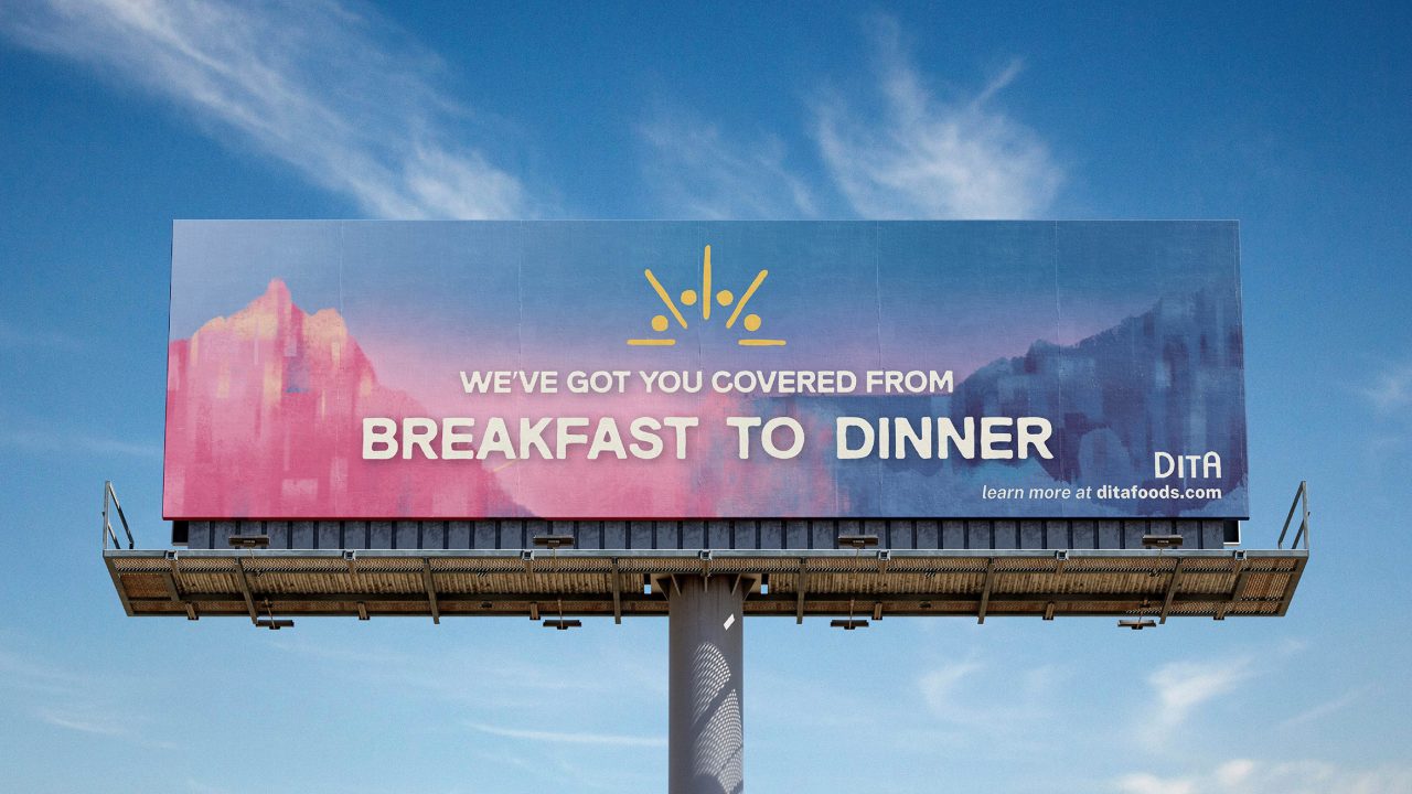 A billboard against a blue sky displays the message: Weve got you covered from BREAKFAST TO DINNER, with a website link to ditafoods.com.