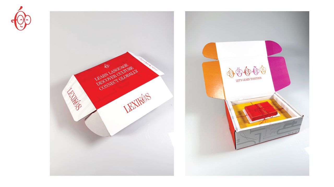 Two views of a branded cardboard box, red and white on the outside with text, and open to show a colorful interior and a red booklet placed inside.