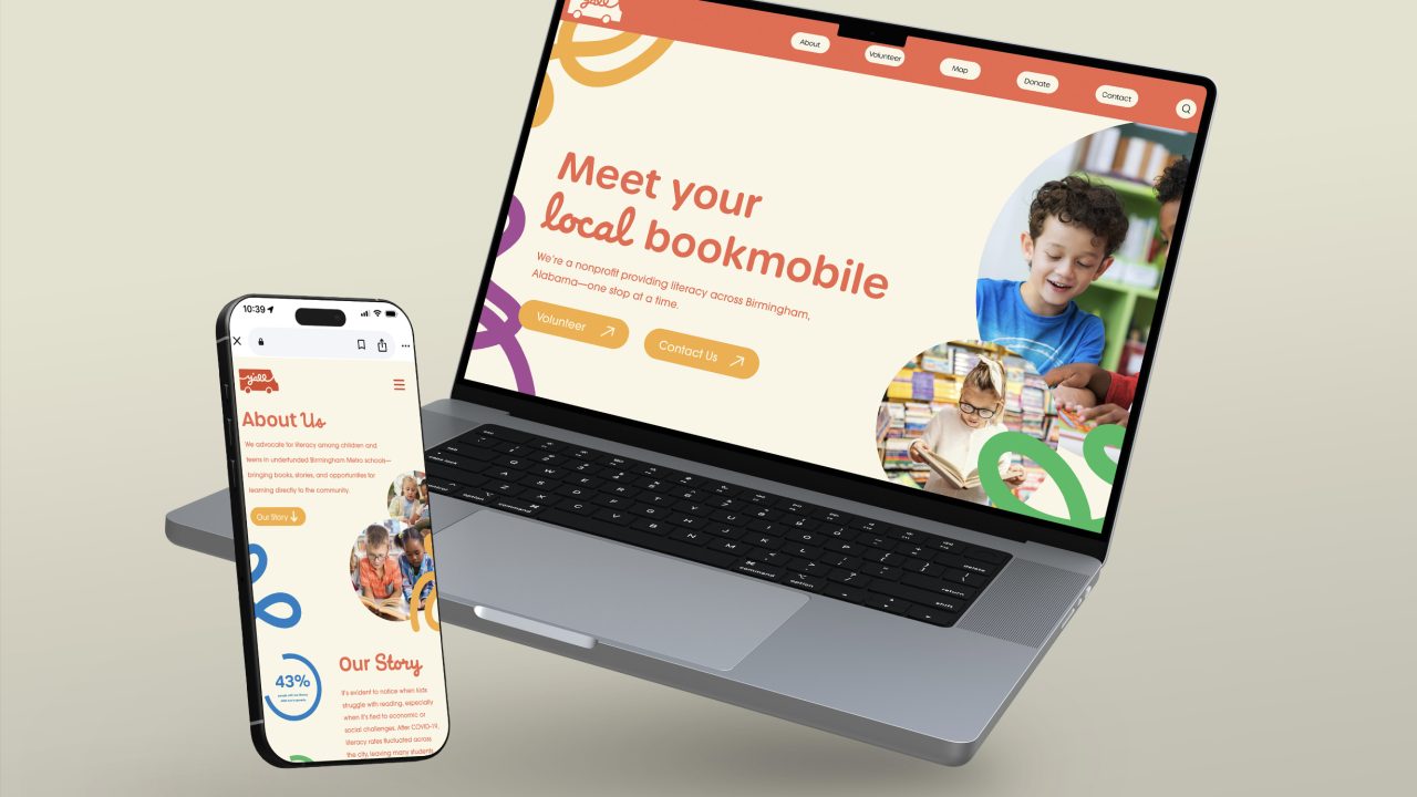 A laptop and smartphone display a website for a local bookmobile, featuring a child reading and colorful, playful design elements.