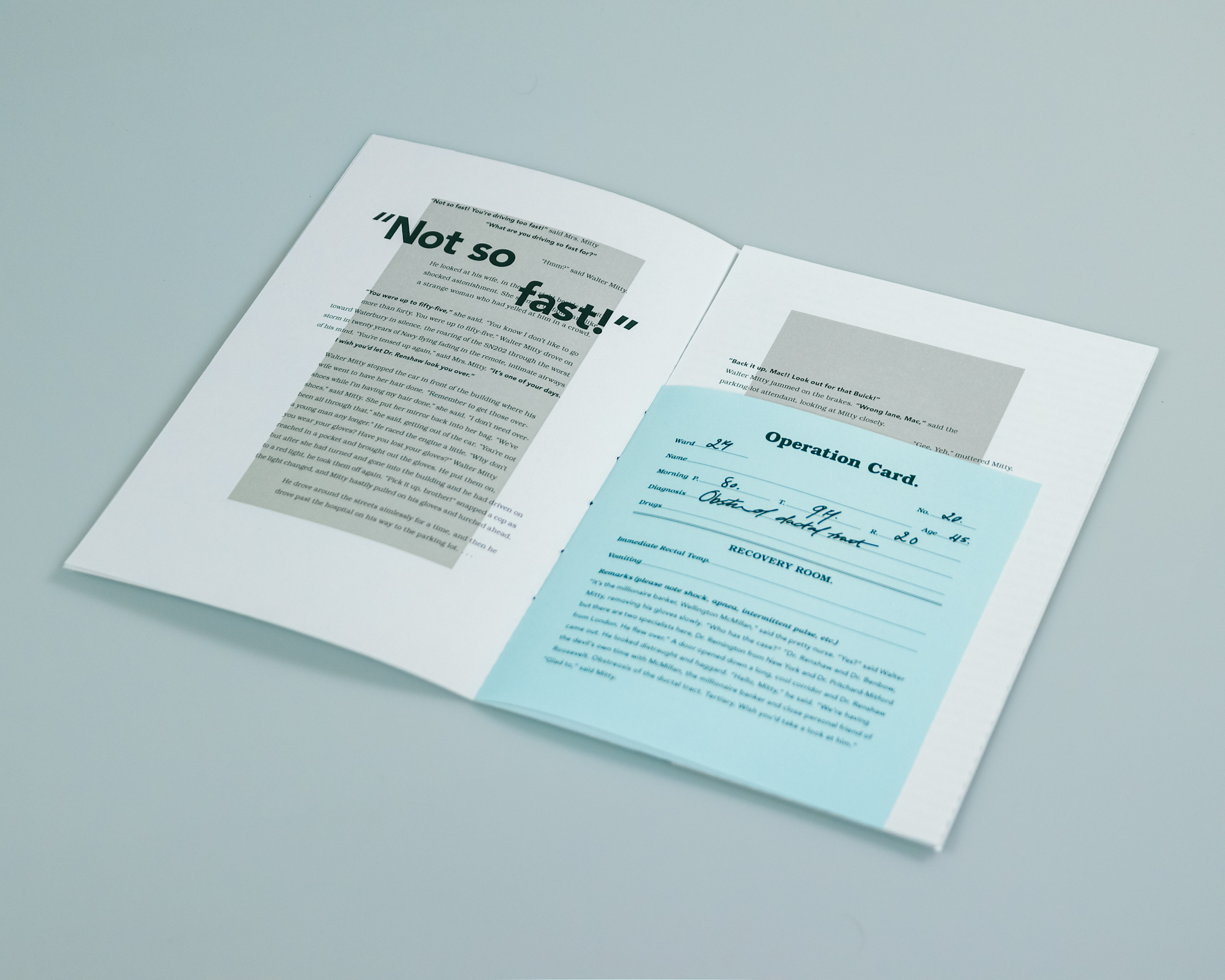 An open booklet on a white surface displays text on the left and a blue Operation Card with handwritten details on the right page.