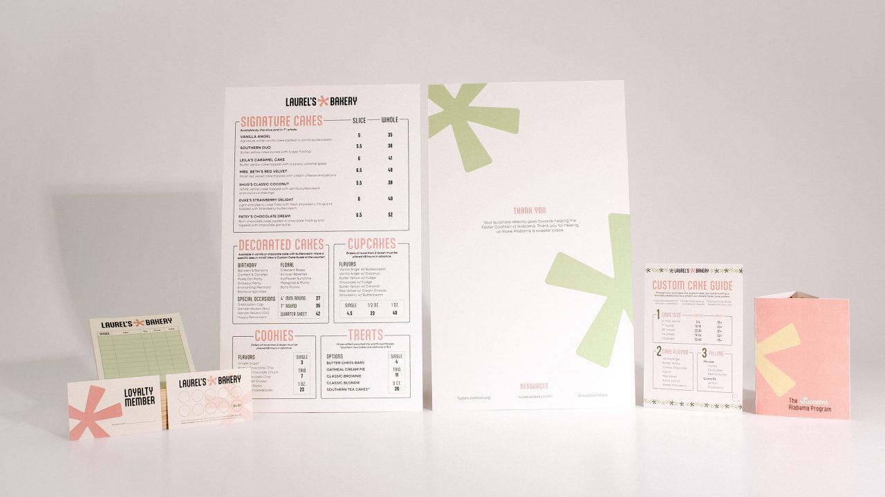 A bakerys branded stationery set, including a menu, thank you card, loyalty card, custom cake guide, and product packaging, displayed against a white background.