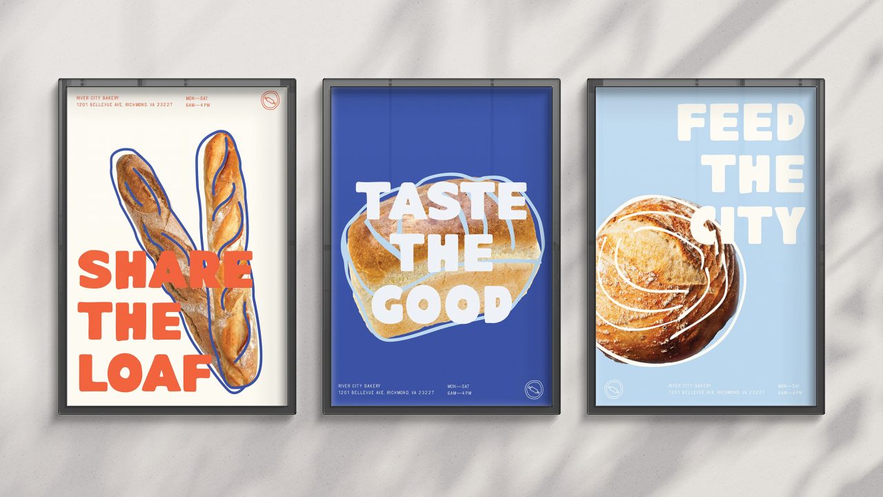 Three framed posters display bread with bold text: SHARE THE LOAF, TASTE THE GOOD, and FEED THE CITY, each on a different colored background.