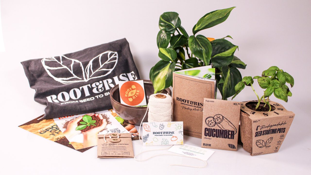 A collection of gardening items including seed starter pots, string, seed packets, plant care cards, a plant, a basil plant, and a Root & Rise tote bag arranged on a white background.