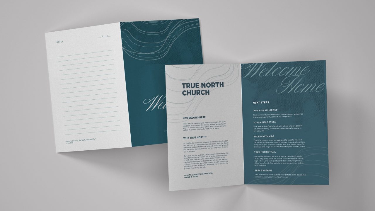 A folded church brochure titled True North Church displays welcome text, next steps, and a lined notes section on a blue and white background.