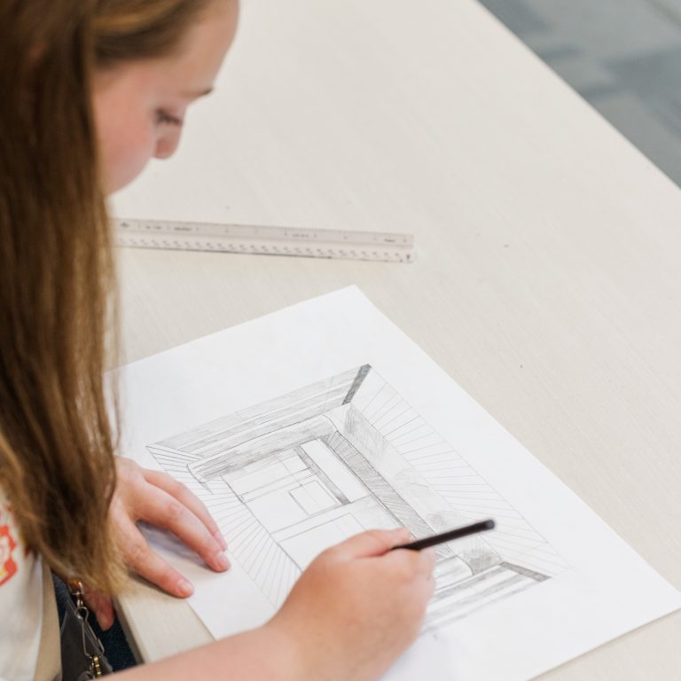 Architecture campers took a field trip to the Ralph Brown Draughon Library to learn perspective drawings.